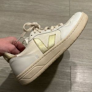 Veja campo gold and white